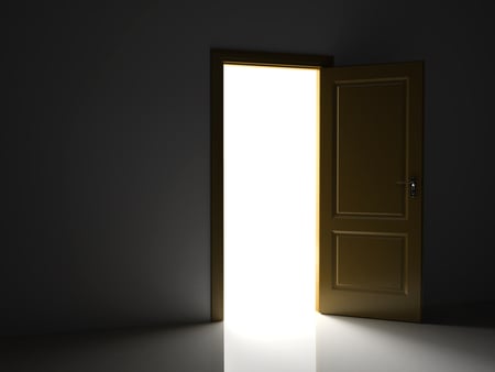 The concept of new client experience. A doorway with light shining through, evoking new possibilities and growth with clients