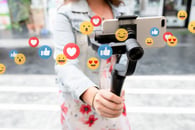 A person recording a video and getting a lot of likes. 