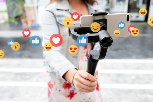 A person recording a video and getting a lot of likes. 