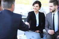 Salesperson talking with a client