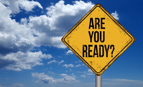 Are You Ready - vintage road sign with a blue sky background.