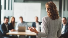 Businessperson giving advice to professionals