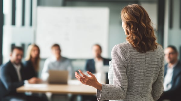 Businessperson giving advice to professionals