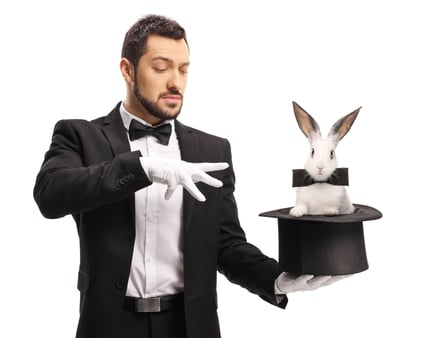 The concept of results magic. A magician who has performed a successful magic trick. 