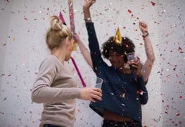 Two women celebrating