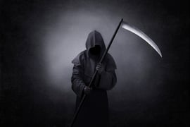 A man dressed up as the Grim Reaper