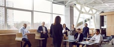 Businesspeople who are listening to a trainer
