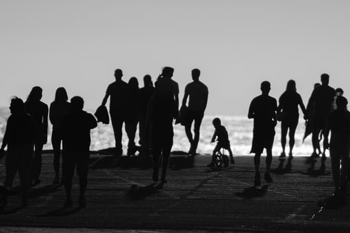 The idea and concept of community. A group of people in a silhouette. 