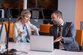 Two businesspeople having an engaging conversation. 