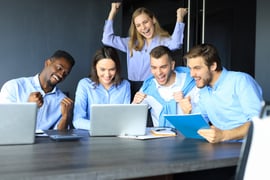 Five excited and happy business people 