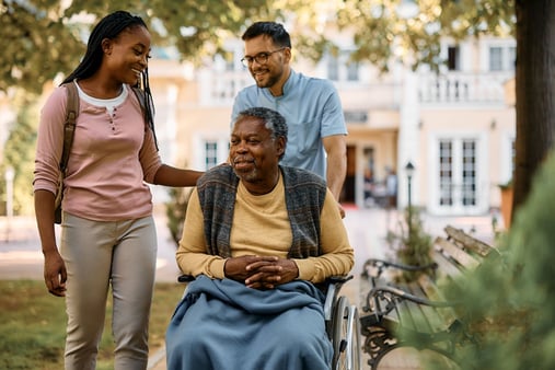 Woman who is visiting and caregiving her aging relative 