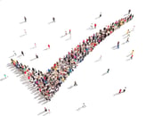 Image of people standing in a checkmark pattern