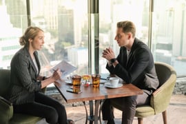 Two businesspeople talking to each other and building trust