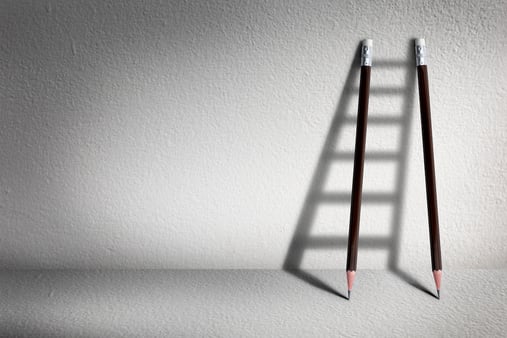 Pencils reflecting a ladder in shadow - Looking at opportunity