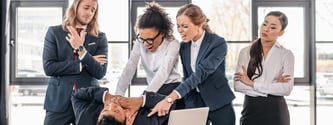 Team of business people fighting
