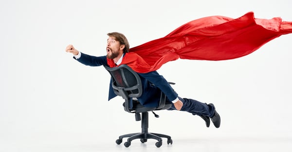 Popular Q4i Posts of 2021 – Get Your Sales On! Man with cape flying on chair