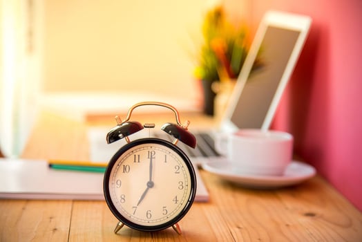 A clock on a desk