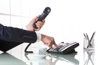 A person making a sales call 