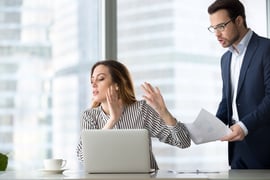 Concept of being a blind spot or a bottleneck. A businessperson ignoring another businessperson. 