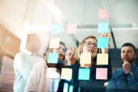 A team developing a process on how to approach a project. 