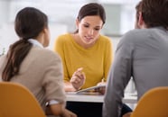 People sitting around and discussing business