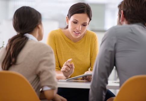 People sitting around and discussing business