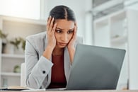 A businessperson stressed out about running a business