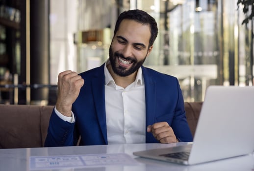 A businessman who is excited about being at work 