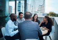 The concept of community and clubs. A business group sitting in a circle. 