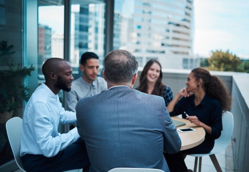 The concept of community and clubs. A business group sitting in a circle. 