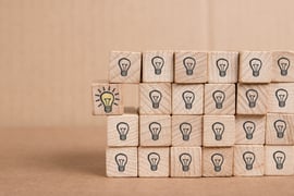 A set of lightbulb blocks, with one lightbulb coming out of the stack 