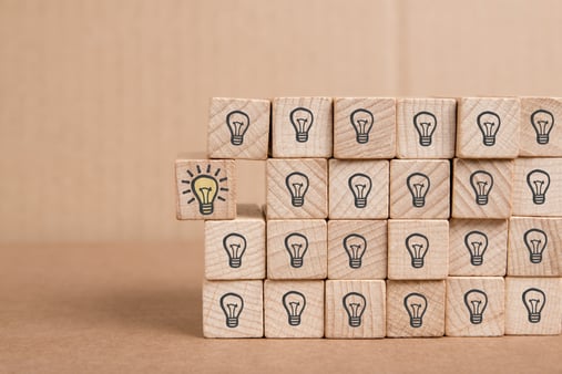 A set of lightbulb blocks, with one lightbulb coming out of the stack 