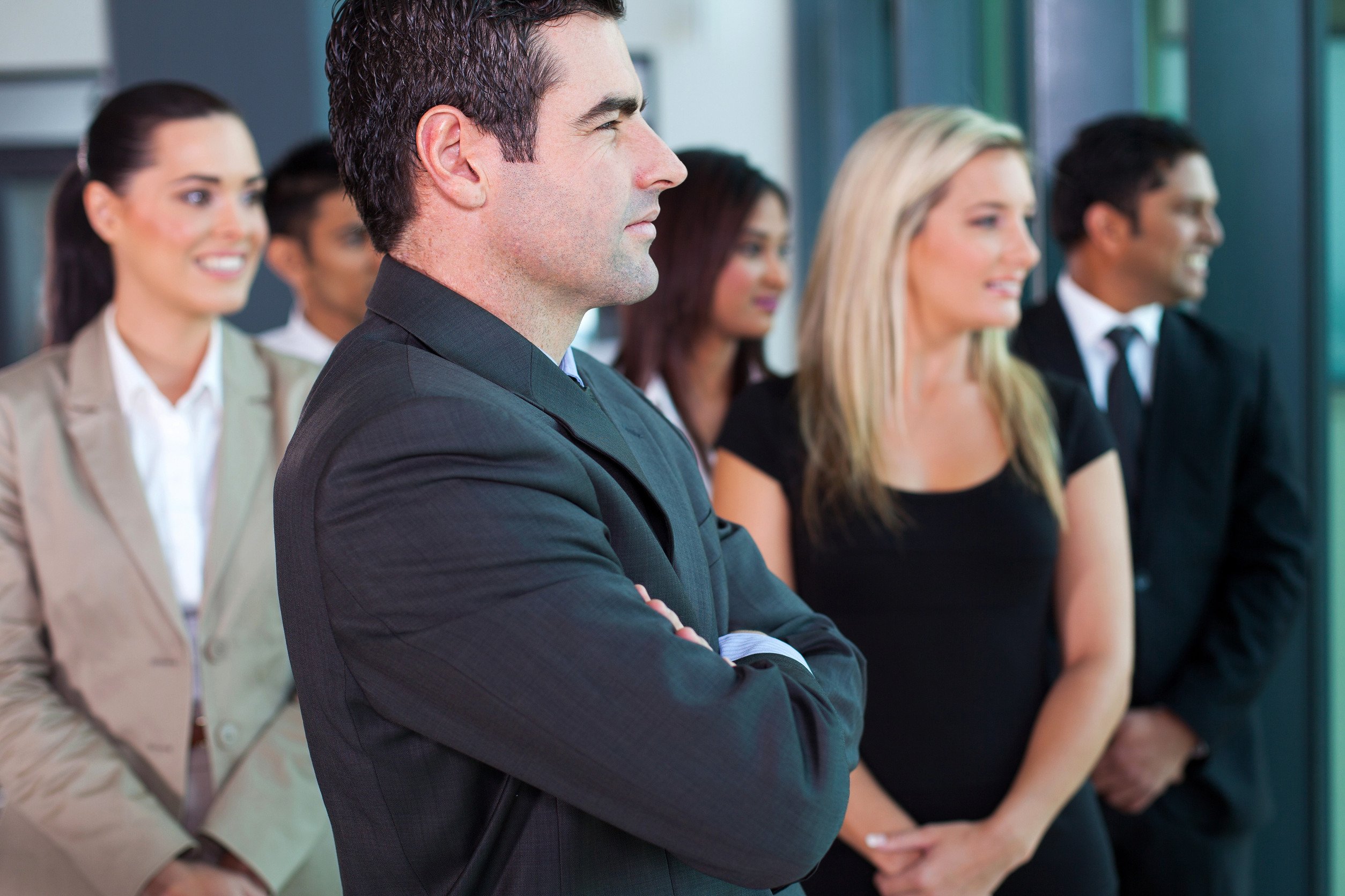 Concept of disruption. Businessperson standing apart from the rest
